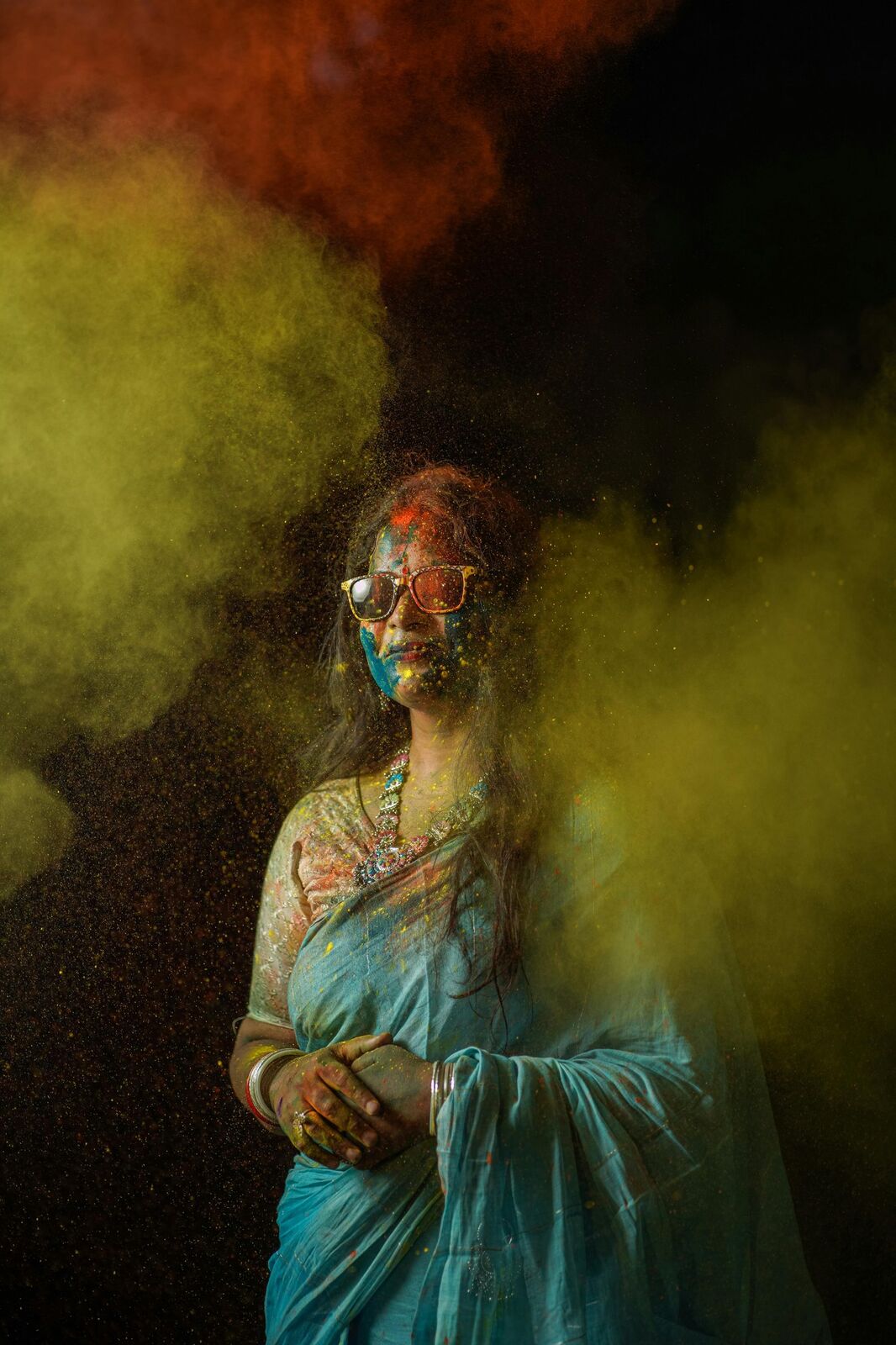 Bride amid coloured smoke